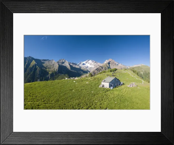 Framed Print : Panoramic aerial view of hut on green meadows, Scermendone Alp, Sondrio province Framed Print : Panoramic aerial view of hut on green meadows, Scermendone Alp, Sondrio province