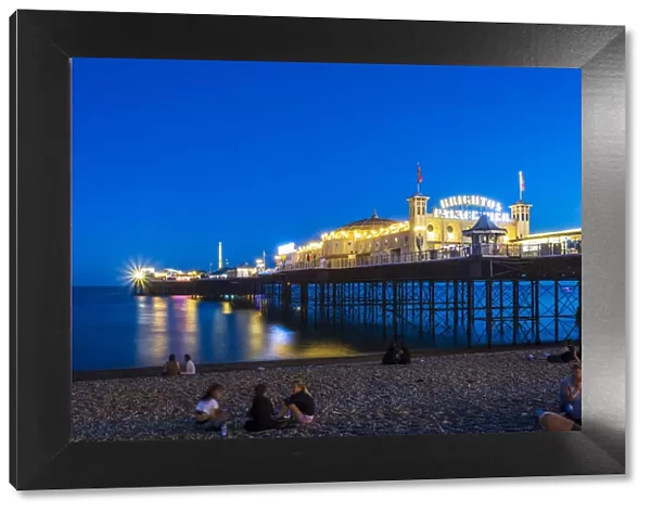 Brighton Palace Pier and beach at night, East Sussex, England, United Kingdom, Europe