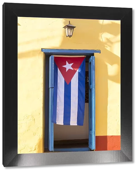 Cuban Flag in doorway, Trinidad, UNESCO World Heritage Site, Sancti Spiritus, Cuba