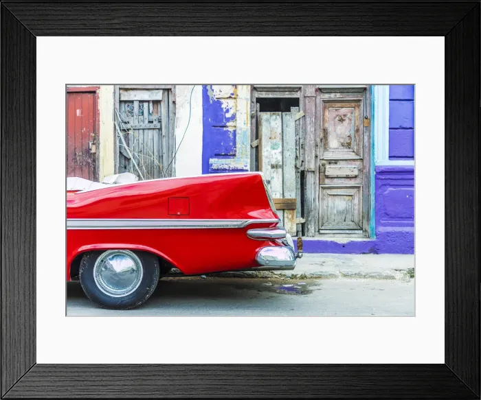 Framed Print : A red vintage car parked against colourful local architecture in Havana, Cuba, West Indies Framed Print : A red vintage car parked against colourful local architecture in Havana, Cuba, West Indies