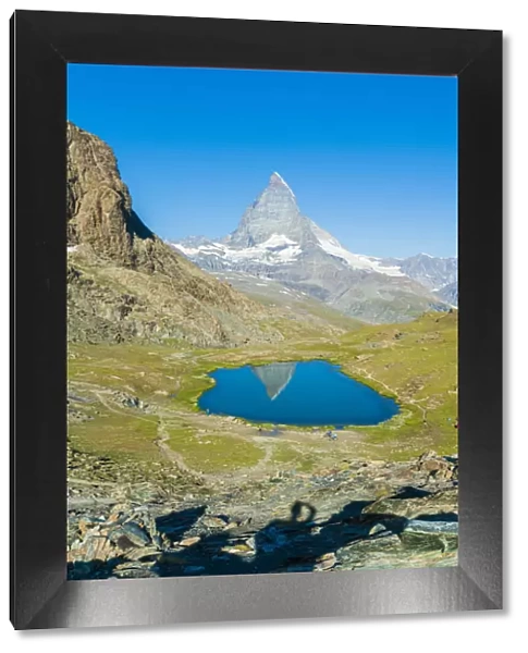 Lake Riffelsee with the Matterhorn in the background, Zermatt, canton of Valais, Swiss Alps