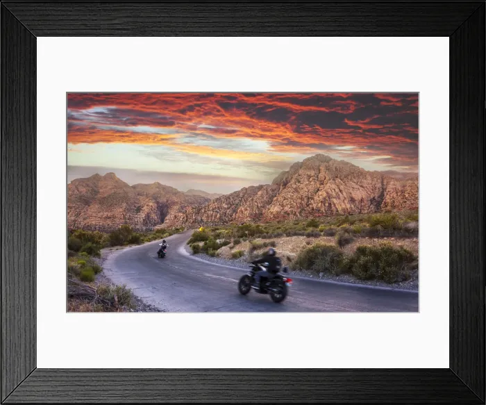 Framed Print : Motocycles driving through The Red Rock Canyon National Recreation Area at sunset Framed Print : Motocycles driving through The Red Rock Canyon National Recreation Area at sunset