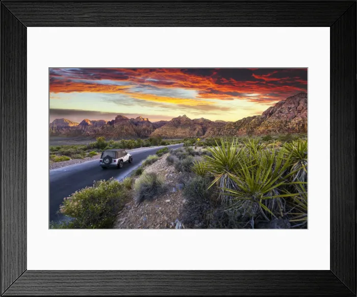 Framed Print : Car driving through The Red Rock Canyon National Recreation Area at sunset, Las Vegas Framed Print : Car driving through The Red Rock Canyon National Recreation Area at sunset, Las Vegas