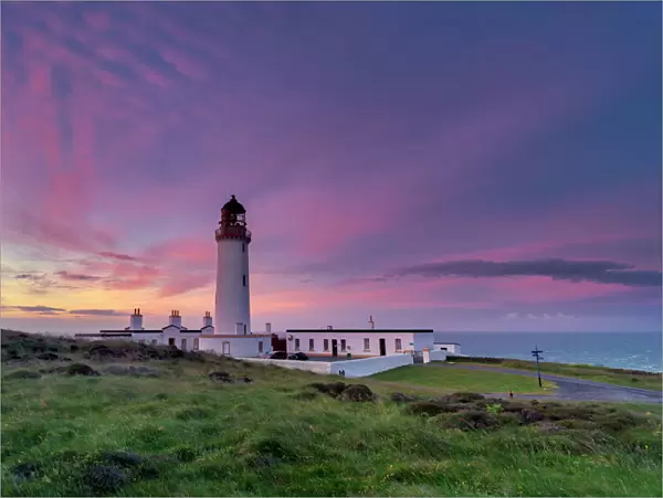Mid-summer sunrise over The Mull of Galloway Lighthouse