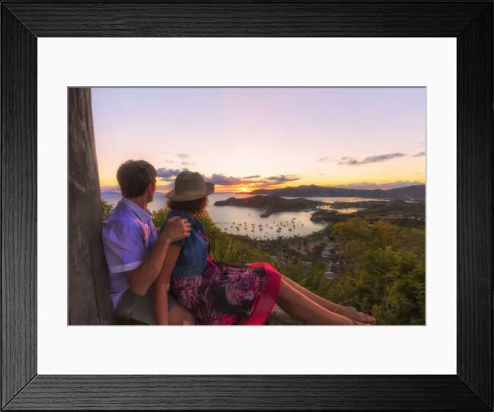 Framed Print : Couple look to the English Harbor from Shirley Heights at sunset, Antigua, Antigua and Barbuda Framed Print : Couple look to the English Harbor from Shirley Heights at sunset, Antigua, Antigua and Barbuda