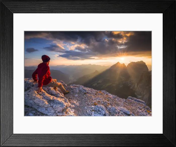 Framed Print : Hiker looks sunset from Piz Pordoi. Fassa Valley, Trentino, Dolomites, Italy, Europe Framed Print : Hiker looks sunset from Piz Pordoi. Fassa Valley, Trentino, Dolomites, Italy, Europe