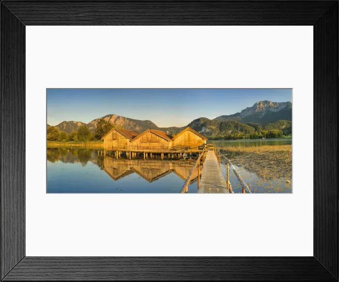 Framed Print : Boathouses at Kochelsee Lake at sunset, Herzogstand and Heimgarten Mountains, Upper Bavaria Framed Print : Boathouses at Kochelsee Lake at sunset, Herzogstand and Heimgarten Mountains, Upper Bavaria
