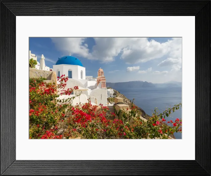 Framed Print : View of blue domed church and sea in Oia village, Santorini, Aegean Island, Cyclades Island Framed Print : View of blue domed church and sea in Oia village, Santorini, Aegean Island, Cyclades Island