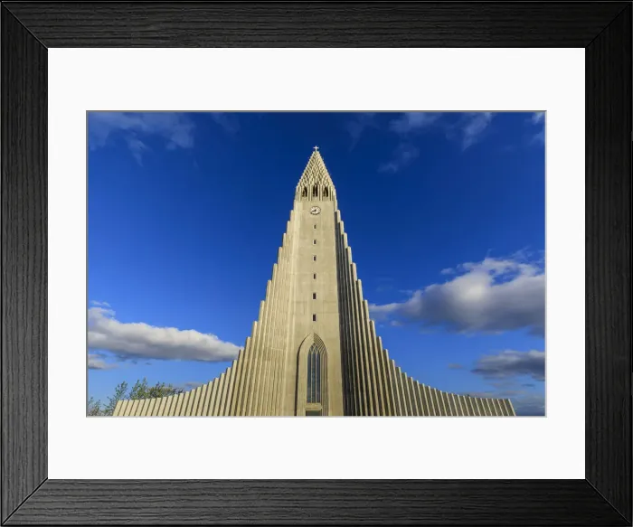 Framed Print : Exterior view of Hallgrimskirkja, the largest Lutheran church in Reykjavik, blue sky Framed Print : Exterior view of Hallgrimskirkja, the largest Lutheran church in Reykjavik, blue sky