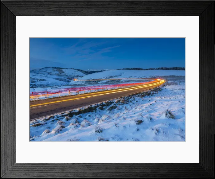 Framed Print : View of trail lights on frozen landscape near Buxton at dusk, High Peak, Derbyshire Framed Print : View of trail lights on frozen landscape near Buxton at dusk, High Peak, Derbyshire