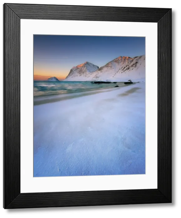 Framed Print : Snow covered Haukland Beach at sunset, Lofoten Islands, Nordland, Norway, Europe