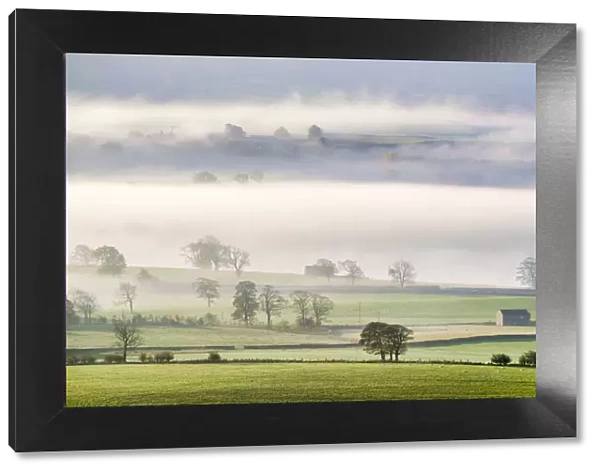 Mist rising over East Halton and Embsay in Lower Wharfedale, North Yorkshire, Yorkshire