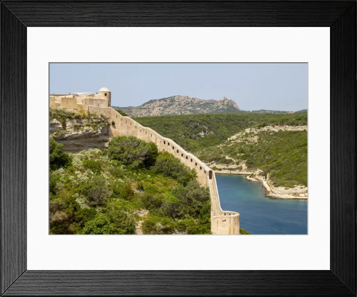 Framed Print : A section of the wall of the Citadel of Bonifacio perched on rugged cliffs, Bonifacio Framed Print : A section of the wall of the Citadel of Bonifacio perched on rugged cliffs, Bonifacio