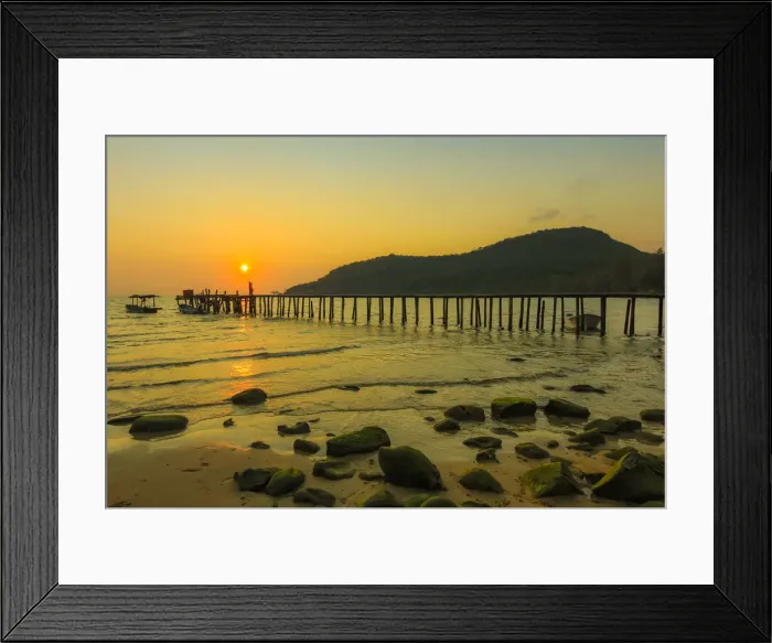 Framed Print : Sunset and pier on the quiet rocky west coast of this holiday island, Lazy Beach