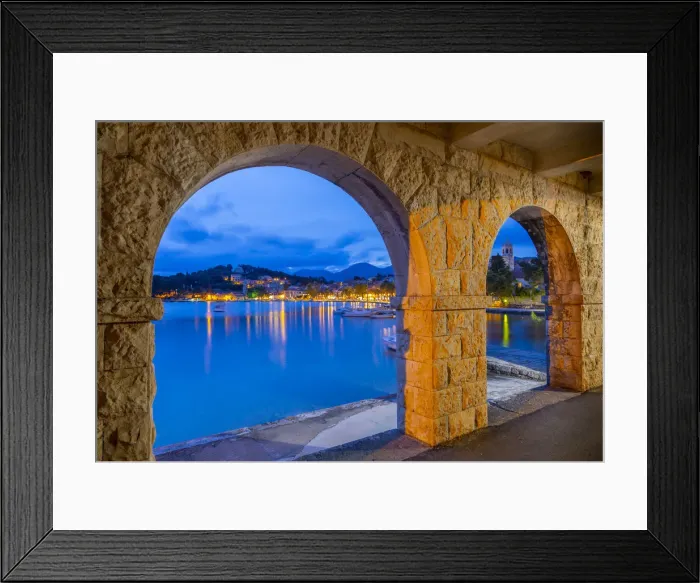 Framed Print : View of town and Crkva Sv. Nikole church through arches at dusk, Cavtat on the Adriatic Framed Print : View of town and Crkva Sv. Nikole church through arches at dusk, Cavtat on the Adriatic