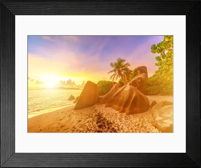 Framed Print : Rocks on beach and palm trees, Anse Source d Argent at sunset, La Digue, Seychelles Framed Print : Rocks on beach and palm trees, Anse Source d Argent at sunset, La Digue, Seychelles