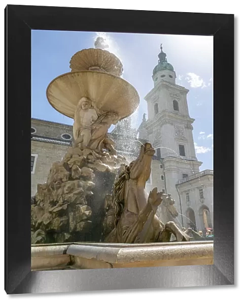 View of Baroque Fountain and Salzburg Cathedral in Residenzplatz, Salzburg, Austria