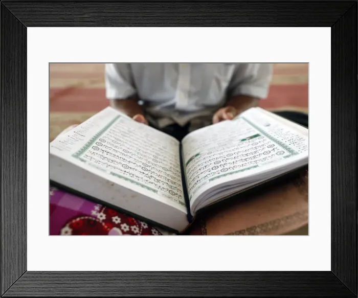 Framed Print : Old man reading Quran sitting on carpet in a mosque, Phnom Penh, Cambodia, Indochina Framed Print : Old man reading Quran sitting on carpet in a mosque, Phnom Penh, Cambodia, Indochina