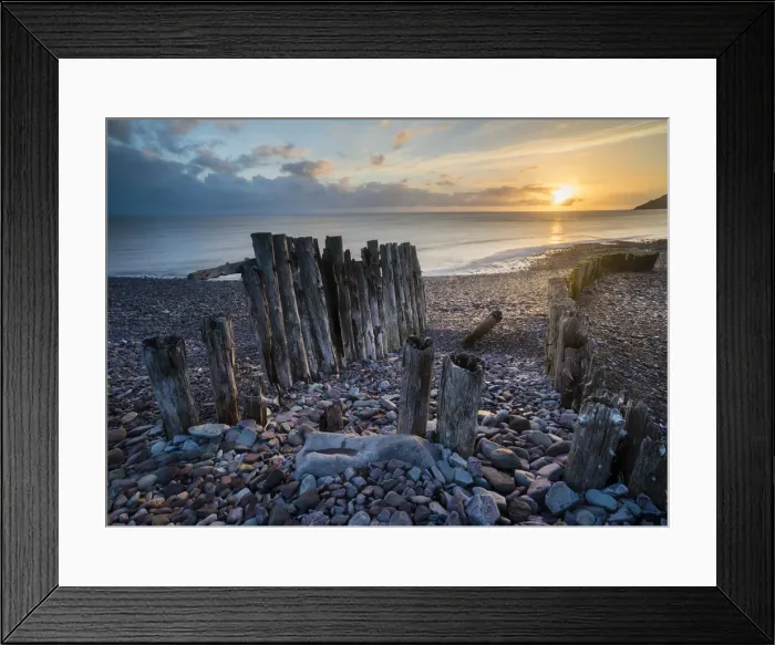 Framed Print : Remains of a wooden groyne at Porlock Weir, sunrise in spring, Somerset, England Framed Print : Remains of a wooden groyne at Porlock Weir, sunrise in spring, Somerset, England