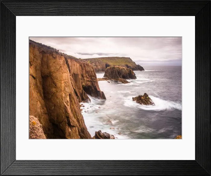 Framed Print : Coastal scenery with Enys Dodnan rock formation at Lands End, Cornwall, England, United Framed Print : Coastal scenery with Enys Dodnan rock formation at Lands End, Cornwall, England, United