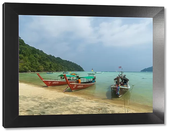 Three long tailed boats on a sandy beach, Thailand, Southeast Asia, Asia