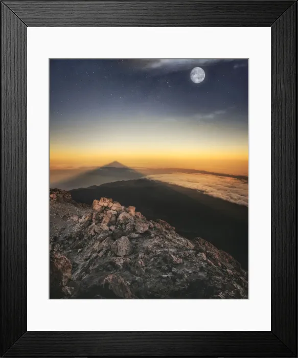 Framed Print : View of El Teide volcano shadow and full moon from the summit right before the sunrise Framed Print : View of El Teide volcano shadow and full moon from the summit right before the sunrise