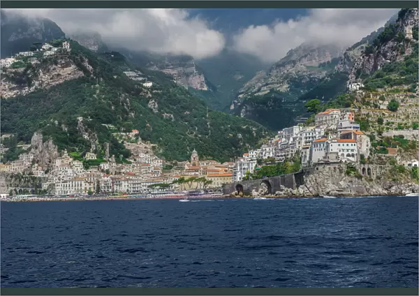 Amalfi Town, landscape sea view with low rise buildings and cliffs along the coastline