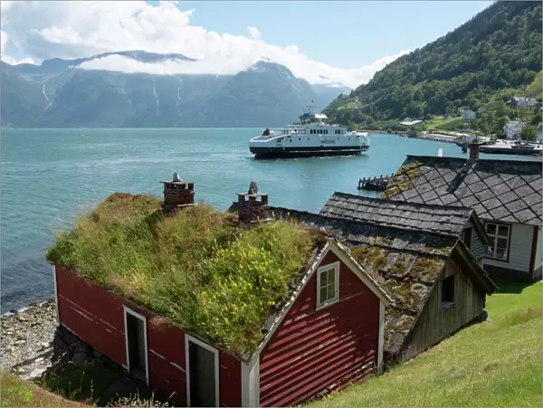A ferry leaving the village of Utne on Hardanger Fjord, Vestlandet, Norway, Scandinavia