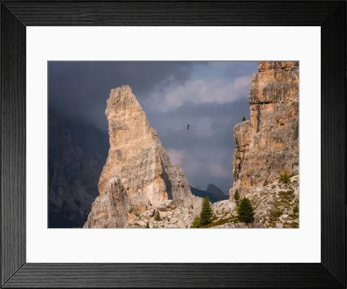 Framed Print : Adventure seeker high wire walking in Cinque Torri, Belluno, Dolomites, Italy, Europe Framed Print : Adventure seeker high wire walking in Cinque Torri, Belluno, Dolomites, Italy, Europe