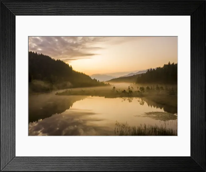 Framed Print : Sky painted orange at dawn with misty land of Pian di Gembro nature Reserve, aerial view Framed Print : Sky painted orange at dawn with misty land of Pian di Gembro nature Reserve, aerial view