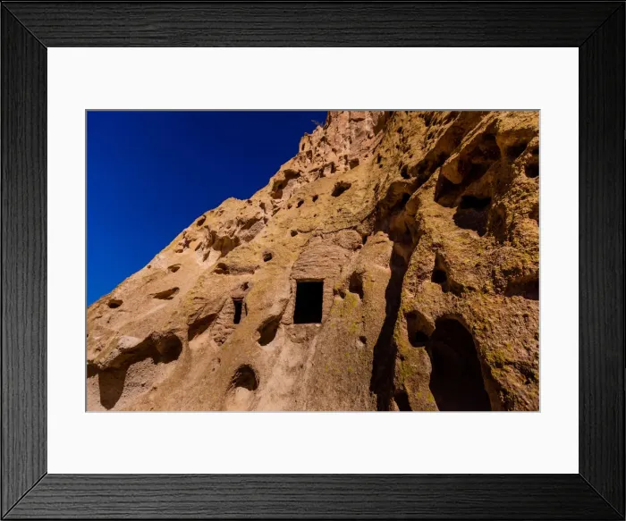 Framed Print : Cave dwellings on the Cliffside of Pueblo Indian Ruins in Bandelier National Monument Framed Print : Cave dwellings on the Cliffside of Pueblo Indian Ruins in Bandelier National Monument
