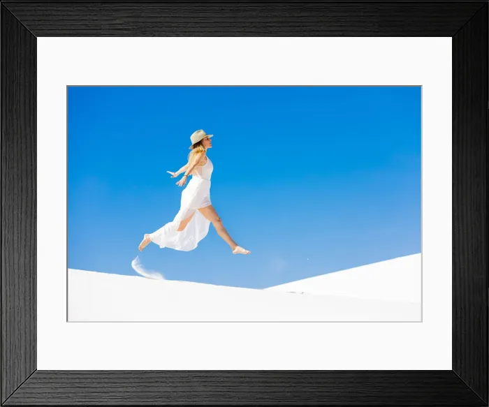 Framed Print : Woman jumping on the Gypsum Sand Dune, White Sands, New Mexico, United States of America Framed Print : Woman jumping on the Gypsum Sand Dune, White Sands, New Mexico, United States of America