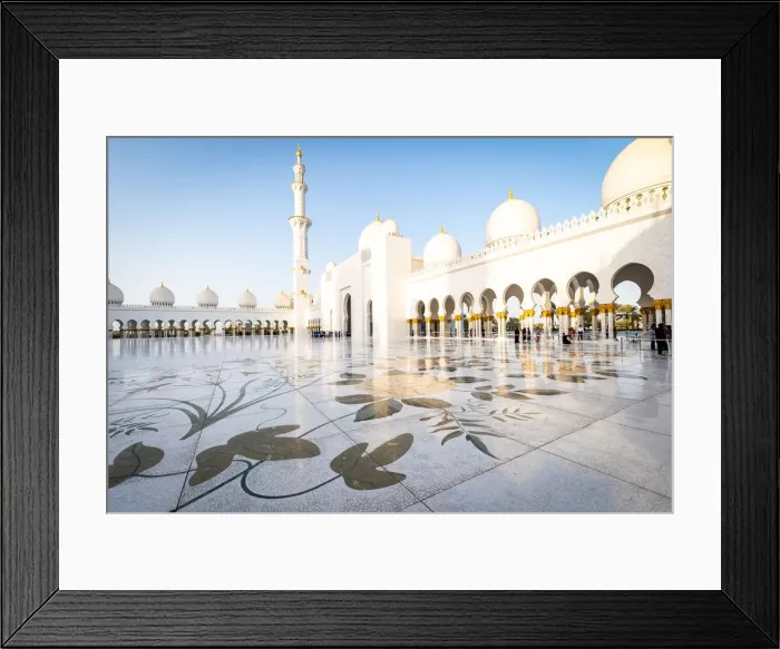 Framed Print : The domes and minarets of Abu Dhabis Grand Mosque viewed across the large marble Framed Print : The domes and minarets of Abu Dhabis Grand Mosque viewed across the large marble