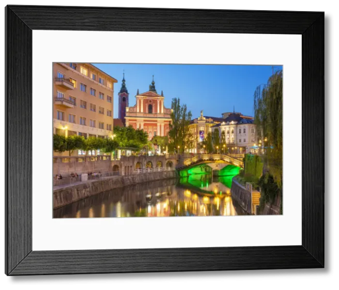 Framed Print : The pink Franciscan Church of the Annunciation, Ljubljanica River and the Triple Bridge Framed Print : The pink Franciscan Church of the Annunciation, Ljubljanica River and the Triple Bridge