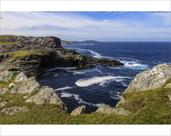 Isle of Fethaland, frothy sea, dramatic coast, view South to Isle of Uyea, North Roe