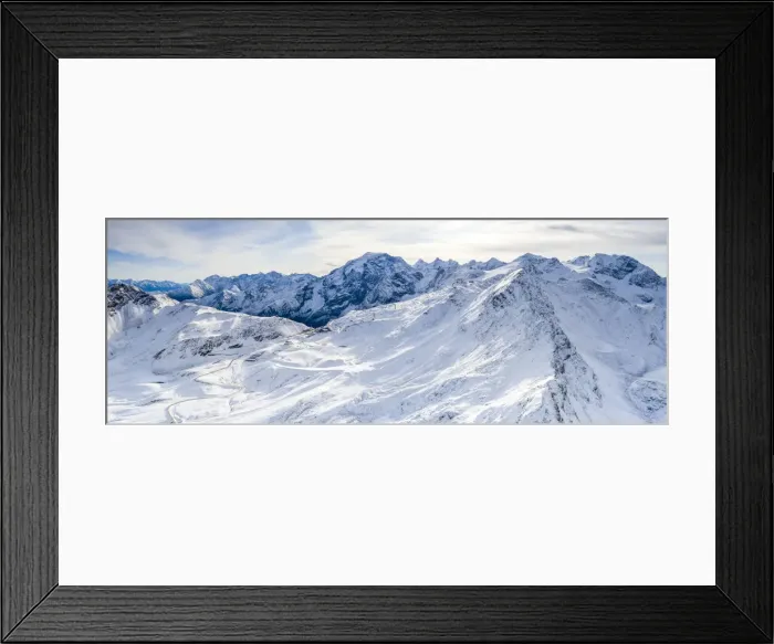 Framed Print : Aerial view by drone of Stelvio Pass road and snowy Ortles mountain, Sondrio province Framed Print : Aerial view by drone of Stelvio Pass road and snowy Ortles mountain, Sondrio province