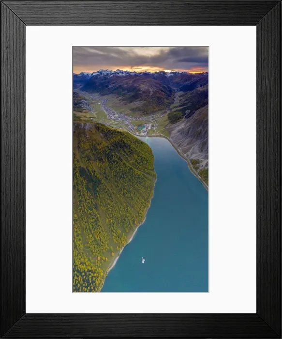 Framed Print : Aerial panoramic of sunset over Livigno and larch trees along the lake in autumn