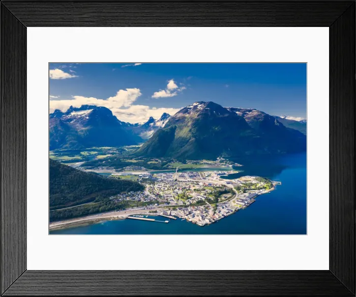Framed Print : Aerial view by drone of mountains and fjord surrounding Andalsnes town, Rauma municipality Framed Print : Aerial view by drone of mountains and fjord surrounding Andalsnes town, Rauma municipality