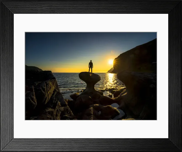 Framed Print : Silhouette of man admiring sunset standing on top of Kannesteinen rock, Oppedal, Vagsoy Framed Print : Silhouette of man admiring sunset standing on top of Kannesteinen rock, Oppedal, Vagsoy