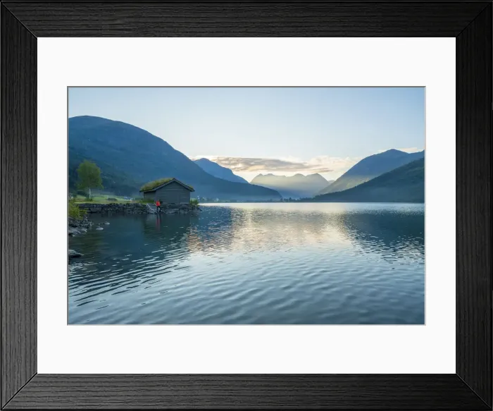 Framed Print : Man on waters edge admiring sunrise over the fjord, Jostedalsbreen National Park Framed Print : Man on waters edge admiring sunrise over the fjord, Jostedalsbreen National Park