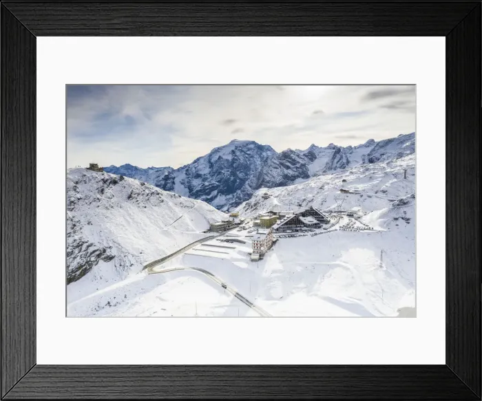 Framed Print : Aerial view of Rifugio Garibaldi, Ortles mount and Stelvio Pass covered with snow Framed Print : Aerial view of Rifugio Garibaldi, Ortles mount and Stelvio Pass covered with snow