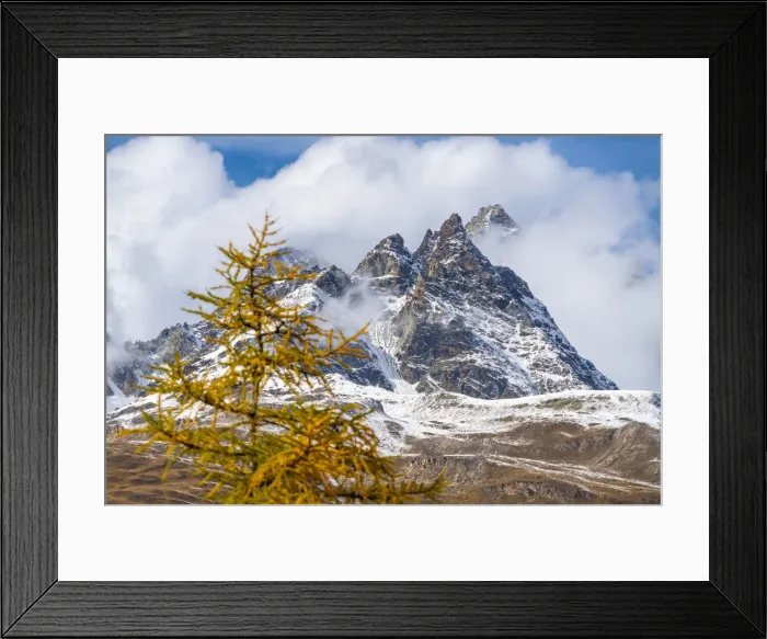 Framed Print : Clouds over the Ober Gabelhorn peak framed by larch trees in autumn, Zermatt, canton Framed Print : Clouds over the Ober Gabelhorn peak framed by larch trees in autumn, Zermatt, canton