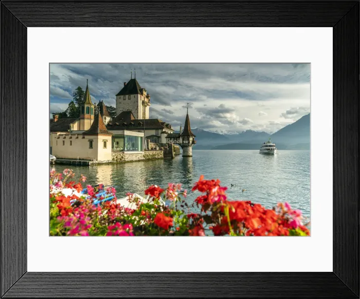 Framed Print : Flowers framing Oberhofen Castle and Lake Thun, Canton of Bern, Switzerland, Europe Framed Print : Flowers framing Oberhofen Castle and Lake Thun, Canton of Bern, Switzerland, Europe
