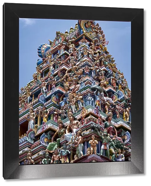 The highly decorative Gopuram (entrance tower) to Sri Srinivasa Perumal Hindu Temple