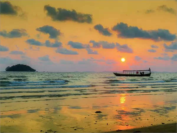 Fishing boat moored off beach south of the city at sunset, Otres Beach, Sihanoukville
