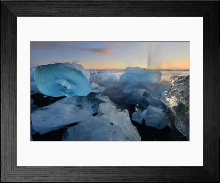 Framed Print : Pieces of glacial ice over black sand being washed by waves, Iceland, Polar Regions Framed Print : Pieces of glacial ice over black sand being washed by waves, Iceland, Polar Regions