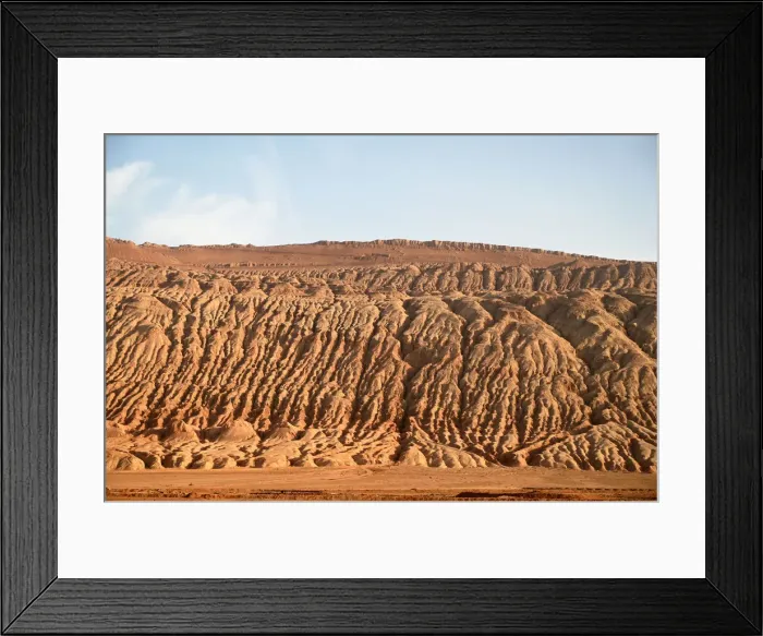 Framed Print : Buildings dwarfed by vast Gobi desert landscape along the Silk Road near Turfan, Xinjiang Framed Print : Buildings dwarfed by vast Gobi desert landscape along the Silk Road near Turfan, Xinjiang