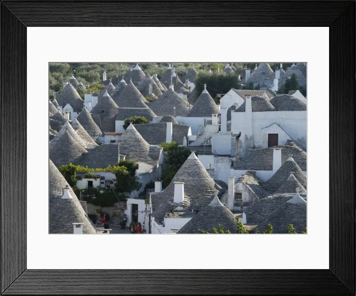 Framed Print : Conical dry stone roofs on trulli, traditonal houses in Alberobello Framed Print : Conical dry stone roofs on trulli, traditonal houses in Alberobello