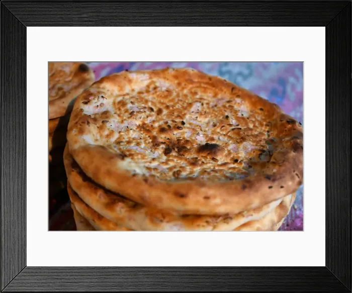 Framed Print : Freshly baked flatbreads for sale in Turfan street night market, Turfan, Xinjiang, China Framed Print : Freshly baked flatbreads for sale in Turfan street night market, Turfan, Xinjiang, China