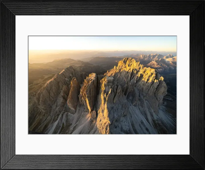 Framed Print : Aerial view of Sassolungo and Sassopiatto lit by the warm autumn sunset, Val Gardena Framed Print : Aerial view of Sassolungo and Sassopiatto lit by the warm autumn sunset, Val Gardena